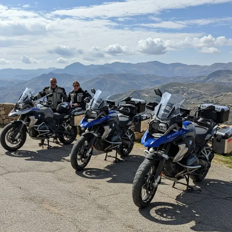 Couple on motorcycles during a guided tour