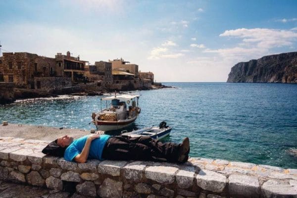 Rider in a rest stop during a motorcycle tour in Greece